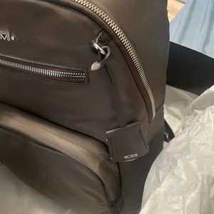 Tumi Hartford Bookbag $345 value Im not sure of color name pictures attached